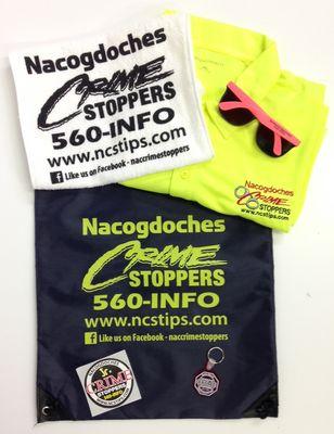 Assorted promotional items for the local Crime Stoppers.