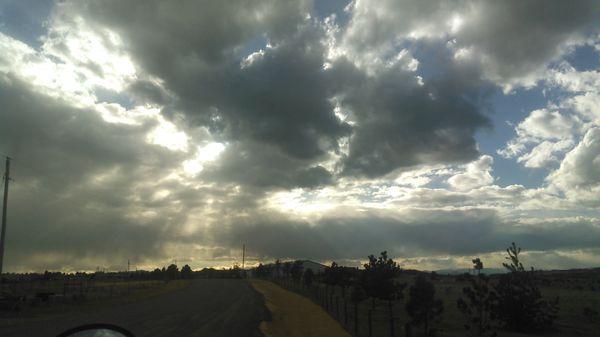 dirt roads and cloudy skies