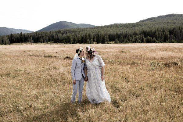 Brides on their wedding day in field at Burgdorf Hot Springs, Idaho.