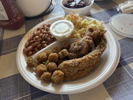 Fried chicken and fried fish plate with okra, pinto beans, and coke slaw