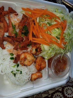 BBQ Pork & BBQ Shrimp  w/vermicelli noodles.  corner filled wit shredded iceberg lettuce. My 'okole is still heapin'red...