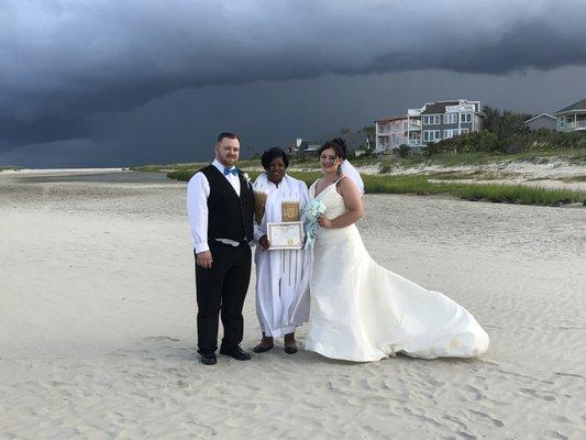 A Saturday afternoon thunderstorm couldn't keep them from starting their life as one. I specialize in wedding services in GA, FL,SC, NC,