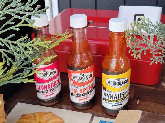 Selection of hot sauces available for tasting and ordering