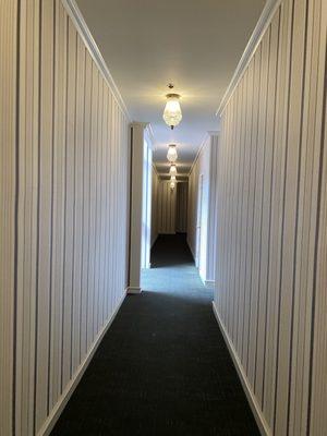 Hallway in Nob Hill Court, leading to apartment 107