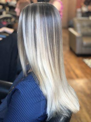 Straight styled heavy blonde balayage