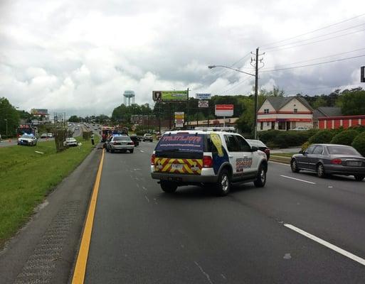 Johnny on the Spot Roadside Assistance Club helping out at the scene of an accident in Clayton County.