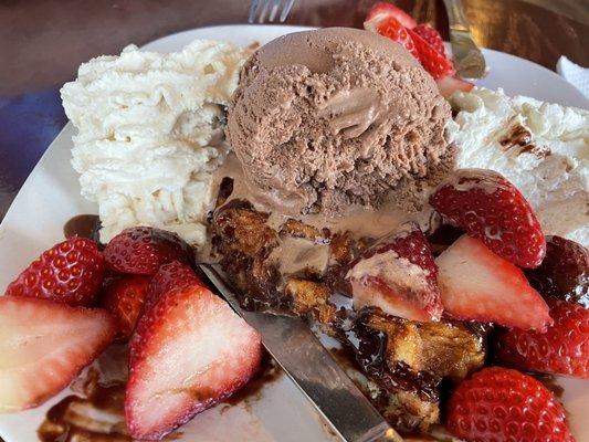 Belgium chocolate waffle with fresh whipped cream and upgraded homemade Belgium chocolate ice cream and fresh strawberries add.