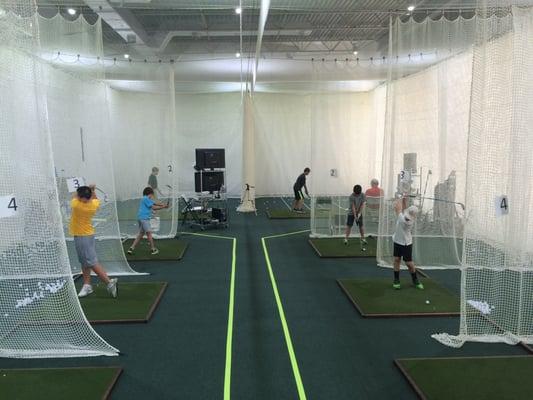 Hitting bays and teaching stations at far end.