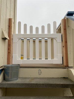 The front side view of our new porch gate that Omar installed.