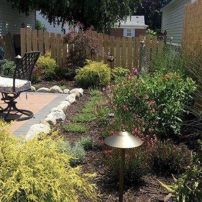 custom patio, perennial garden, and landscape lighting design and installation