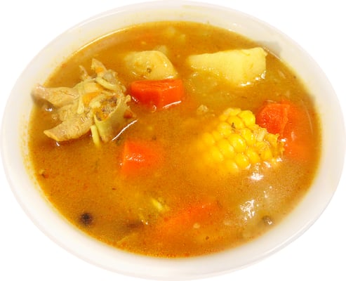 Chicken Soup with pumpkin, carrots and other spices.