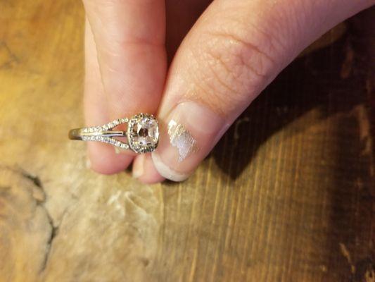 Ring After, Clear Gap between Center & Surrounding Stones.