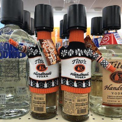 These Tito's vodka bottles are having an ugly Christmas sweater party. :)