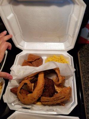 Seafood platter A. Fish, scallops,shrimp & crab cake. Comes with hush puppies and two sides.