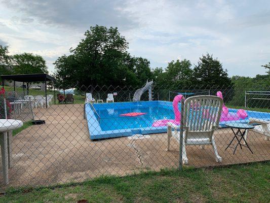 They have a pool AND small playground!