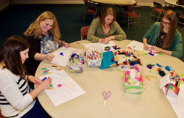 Working on therapeutic art projects together.