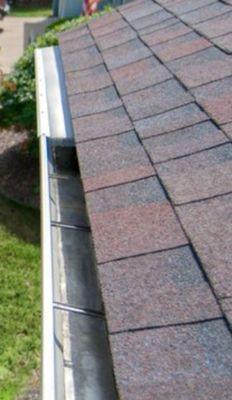 Installing gutter covers..