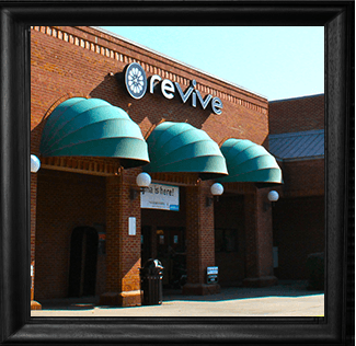 front of the Revive Woodstock location