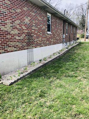 A recent rock job we did, cleaning out bed, redoing the blocks, adding rock and plants.