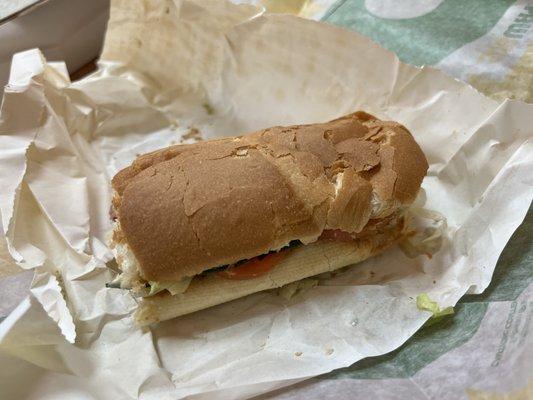 The two folded pieces of roast beef are barely visible in my sandwich.