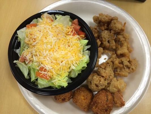 Fried oysters an hush puppy an salad