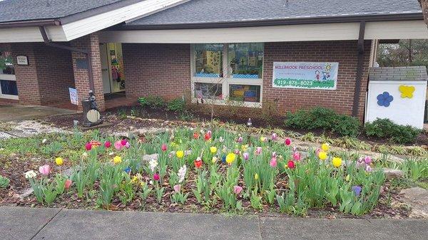 Our school with the beautiful flowers planted by the children!