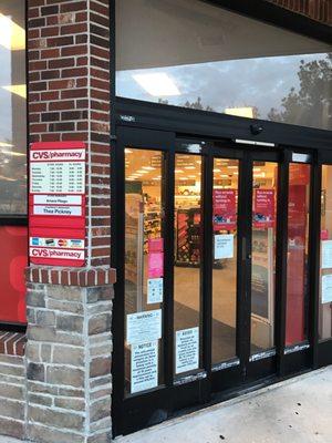 Front entrance with store hours clearly marked