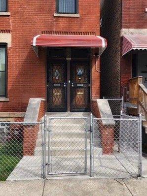 The awning is aligned with a row of accent bricks at the top.