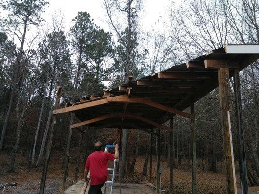 Cutting back the top on an old shed