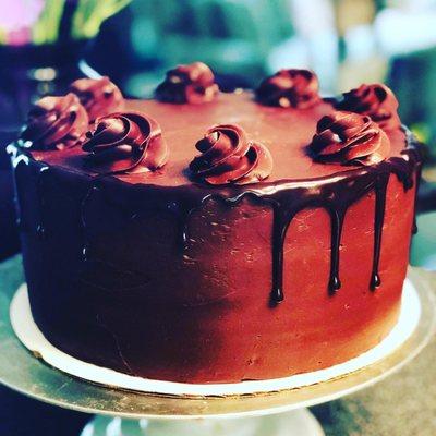 3C Chocolate Decadence 8" 3 layers of moist chocolate cake with rich chocolate ganache between each layer. - $6 p/slice / Whole Cake $50