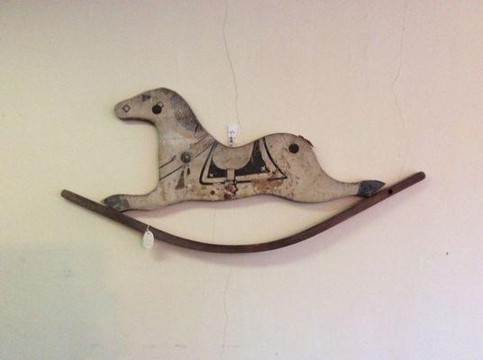 This rocking horse decor is reclaimed from an antique, child's rocking horse.