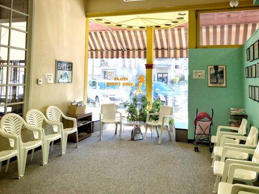 Waiting room area. Has a bookshelf of Highlights magazine for the little ones.