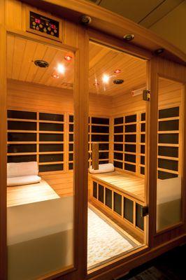 Infrared sauna with chronotherapy lighting. Tucked away for privacy & always accompanied by light spa music.