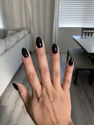 Short black almond nails.