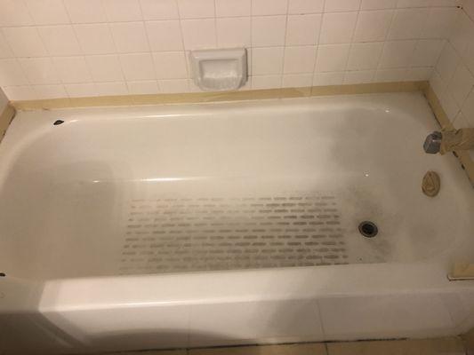 Bathtub before being refurbished.