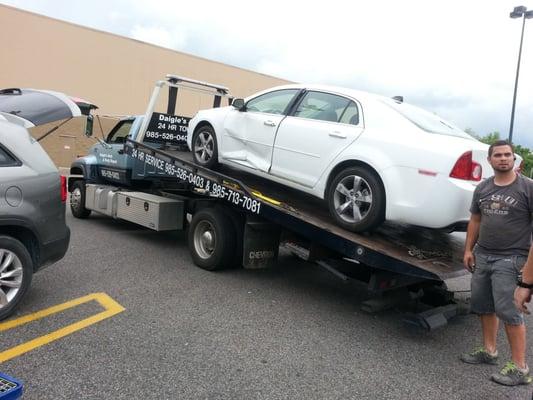 My poor car after getting hit. Daigle's took care of everything and had my car fixed before the insurance company was finished.