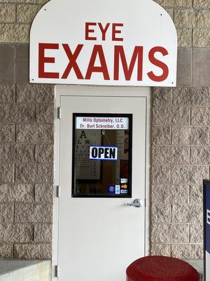 Entrance located outside of Costco in corner by tire shop entrance