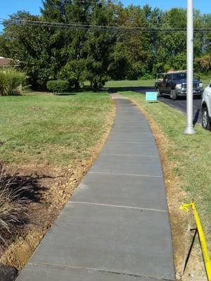 Sidewalk 4" thick. Prepped to last forever