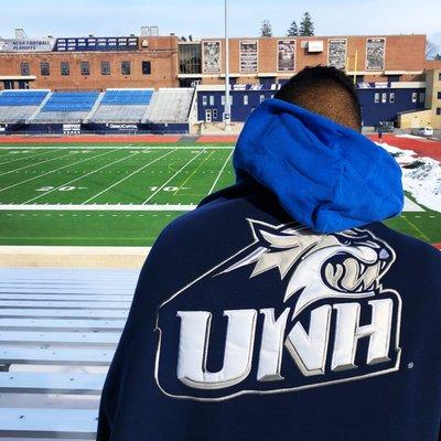 Our embroidered UNH Cathead blanket.