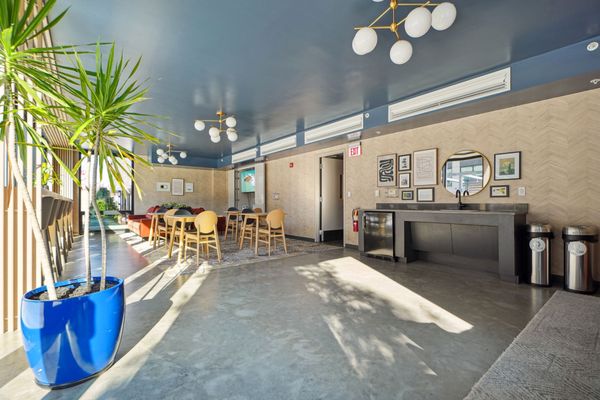 View of clubroom space including dining table