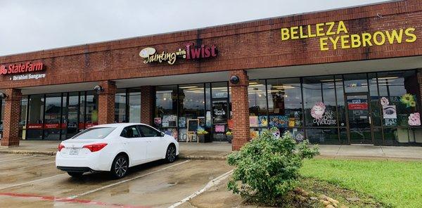 Belleza is located beside Painting With a Twist and right across from Albertsons.