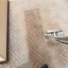 This is an example of really dirty carpet getting cleaned.