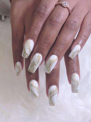 Long nails with white color and gold marble :)