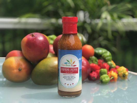 Papaya PEPPA Fire Hot - an amazing blend of FRESH papaya, with fresh scotch bonnet peppers, and Caribbean herbs and spices.