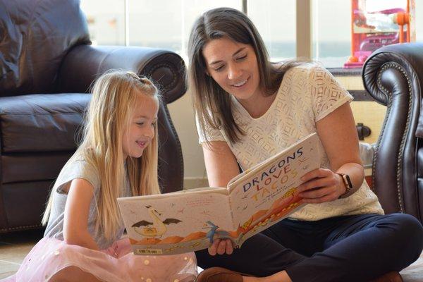 Dr. Katherine McKernan uses functional activities, such as book reading and play, to improve speech-language skills.