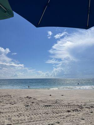 Great beach access with complimentary chairs and umbrellas.