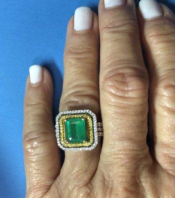 Emerald, Yellow Sapphire and diamond halo cocktail ring.