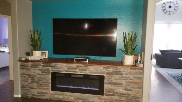 Custom Electric Fireplace with mantle and hung 75" TV with Mount.