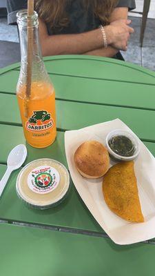 Colombian Empanada, Caramel Flan, Yoli's famous sauce, Pandebono