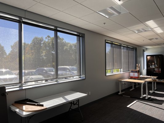 Solar roller shades in a commercial application. Block UV rays and heat transfer